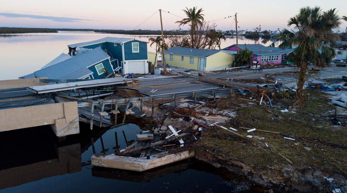 Aerial footage shows a boat dock serves as a makeshift bridge on Saturday, Oct. 1, 2022, in Matlacha, Fla. Hurricane Ian washed away part of a bridge in Matlacha, Fla., making the road to Pine Island impassable.