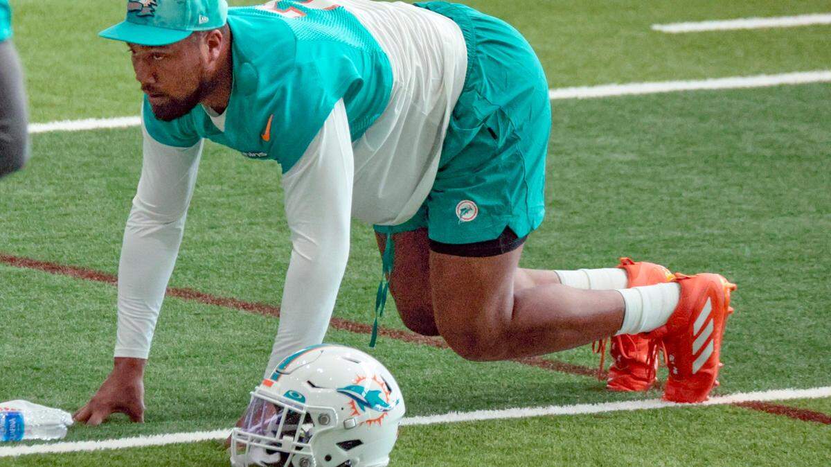 Miami Dolphins linebacker Bradley Chubb (2) stretches during practice at the indoor practice facility at Baptist Health Training Complex in Miami Gardens on Wednesday, November 2, 2022.