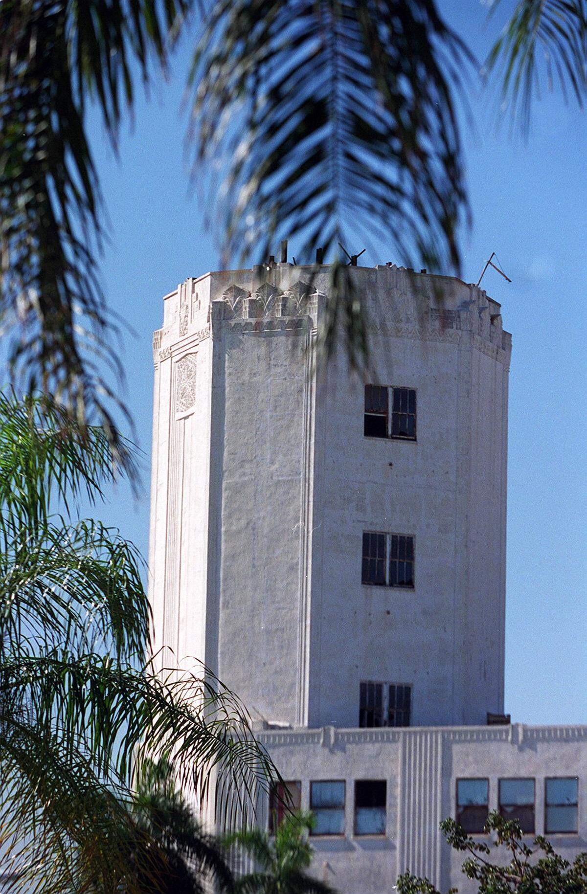In a 1995 file photo, the Sears Tower stands above the vacant store in downtown Miami