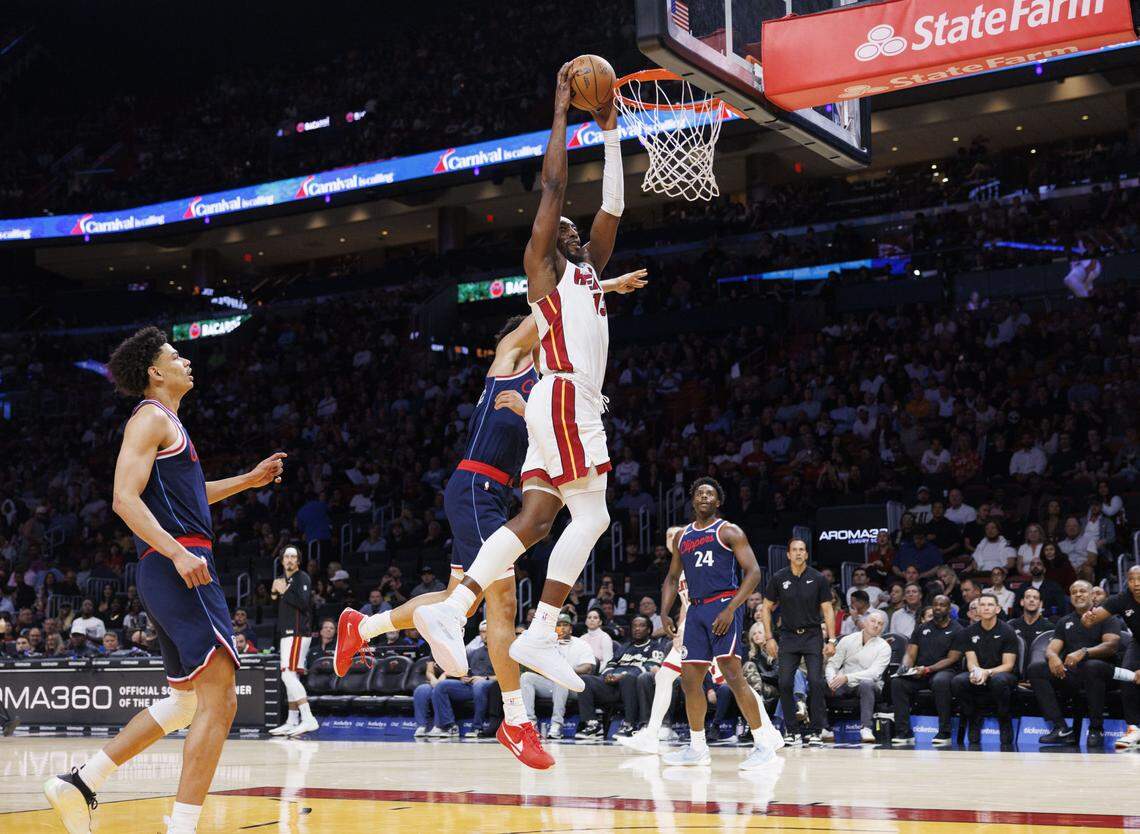 Miami Heat center Bam Adebayo (13) dunks the ball during the third quarter of a game against the Los Angeles Clippers on Monday, Dec. 1, 2025, at Kaseya Center in Miami, Fla. 