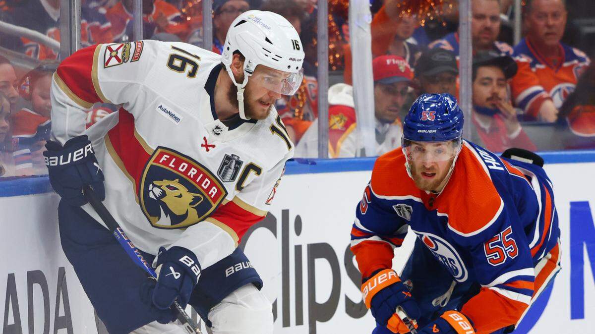 Florida Panthers center Aleksander Barkov (16) controls the puck against Edmonton Oilers left wing Dylan Holloway (55) in the second period in game six of the 2024 Stanley Cup Final on Friday at Rogers Place in Edmonton, Alberta.