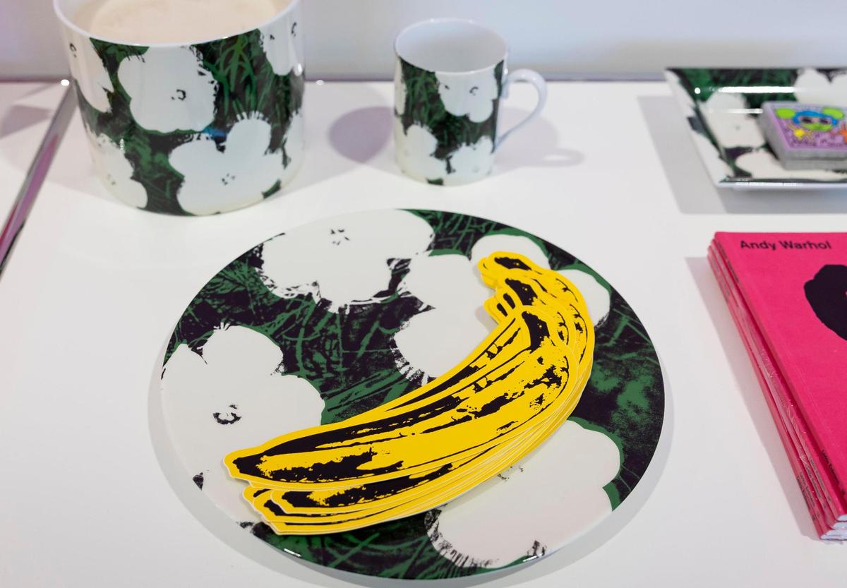 A banana sticker is on sale for $8 at the Art Basel store located at the entrance of the show at the Miami Beach Convention Center on Wednesday, Dec. 4, 2024, in Miami Beach, Fla.