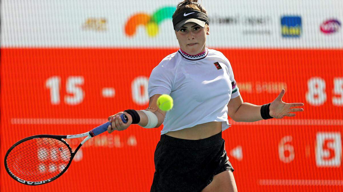 Bianca Andreescu of Canada returns a shot against Irina-Camelia Begu of Romania during their match at Miami Open tennis tournament on Thursday, March 21, 2019 at Hard Rock Stadium in Miami Gardens.