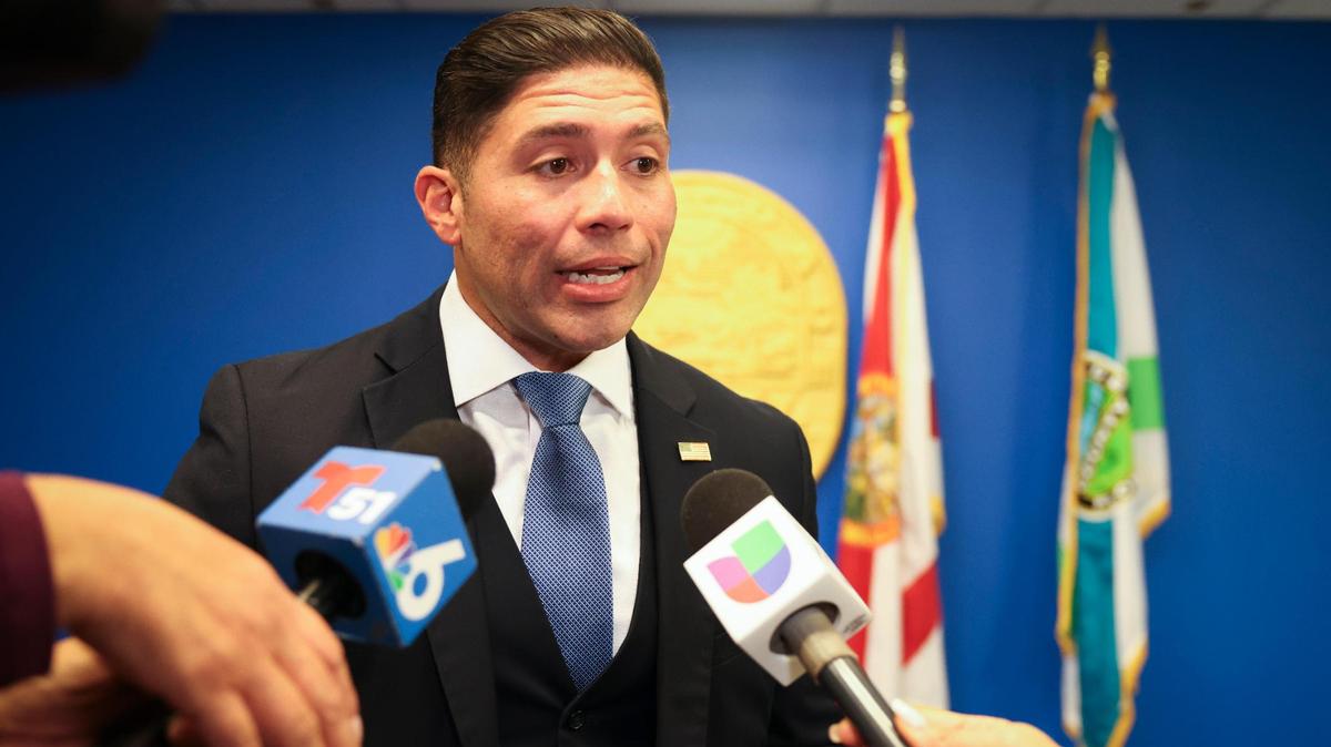 Commissioner Roberto Gonzalez speaks to the press about the legislation he sponsored to remove the fluoride from public drinking water, something that has been done since the 1950s, during the Miami-Dade County Commission meeting on Tuesday, April 1, 2025, at the Stephen P. Clark Government Center in downtown Miami.