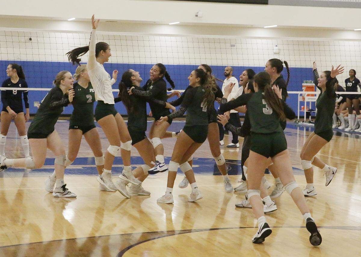 Pine Crest Panthers celebrate victory in the Region 4-3A final volleyball game against Gulliver Raiders on Tuesday, October 28, 2025 at Gulliver Prep in Miami. Andrew Uloza / for Miami Herald