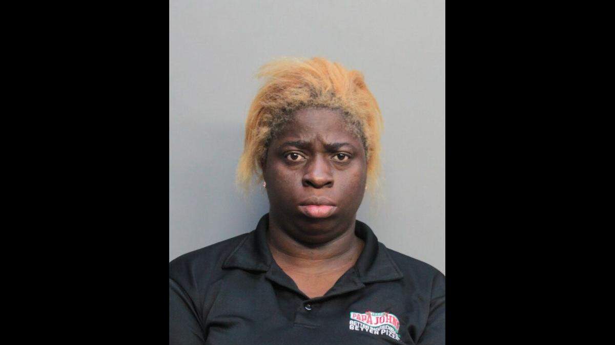 An argument turned into road rage Wednesday night as two drivers shot at each other in Brownsville. Georgina Thomas (shown) was arrested in front of a Papa Johns.