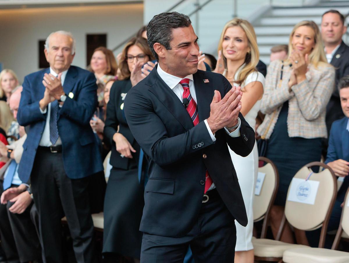 Miami Mayor Francis Suarez salutes the audience as he is called to the podium before his first speech as a candidate for the 2024 Republican presidential nomination at the Ronald Reagan Presidential Library in Simi Valley, California, on Thursday, June 15, 2023.