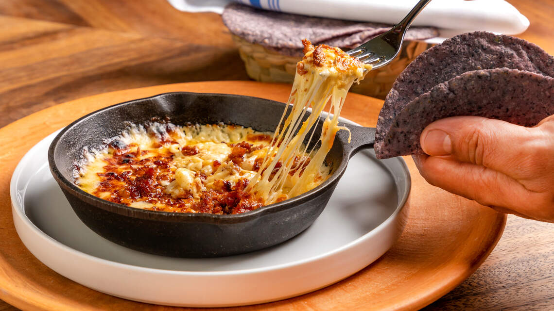 Be it mac and cheese or gooey queso fundido, Miami’s top 6 cheese dishes always make us melt