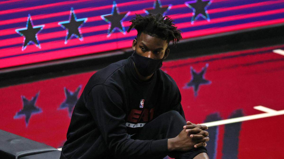 Miami Heat forward Jimmy Butler (22) looks from the bench in the second half of their NBA basketball game against the Atlanta Hawks at the AmericanAirlines Arena on Sunday, February 28, 2021.