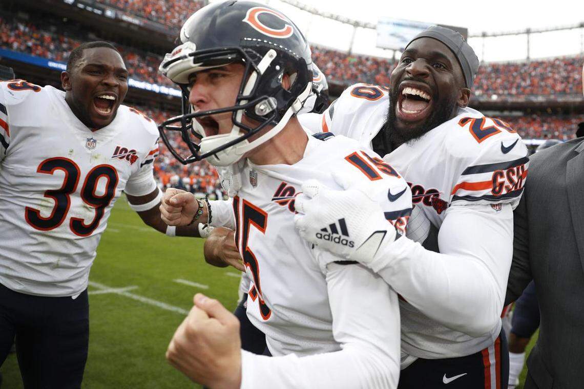 Chicago Bears kicker Eddy Pineiro is swarmed by teammates after kicking the game-winning 53-yard field goal to beat the Denver Broncos 16-14 on Sept. 15, 2019