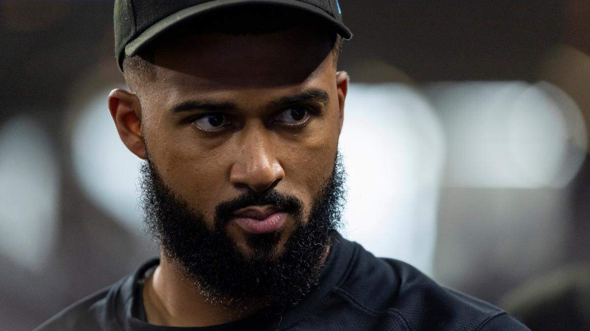 Miami Marlins starting pitcher Sandy Alcantara (22) looks on from the dugout in the second inning of an MLB game against the San Francisco Giants at loanDepot park on Monday, April 17, 2023, in Miami, Fla.