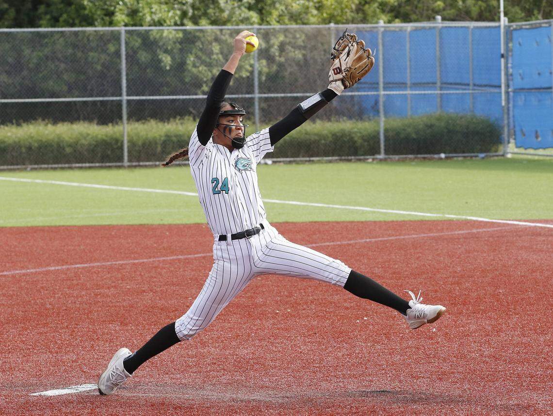 Coral Reef Barracudas pitcher Erin Zambrano (24) delivers the pitch against Goleman Gators during GMAC softball championship game on Friday, April 17, 2026 at JC Bermudez HS in Doral. Andrew Uloza / for Miami Herald