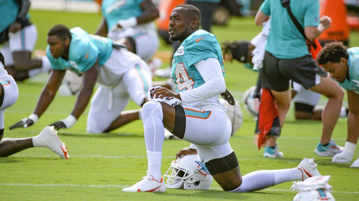 Miami Dolphins cornerback Mackensie Alexander (34) stretches during practice at Baptist Health Training Complex in Miami Gardens on Wednesday, August 17, 2022.