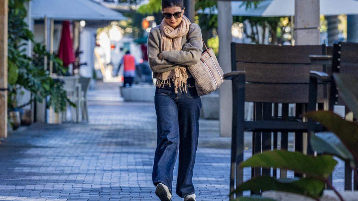 The cold temperatures didn't stop Maria Faria, from taking a walk along Miracle Mile in Coral Gables, as Miami woke to one of its coldest New Year's Eves in decades, on Wednesday, December 31, 2025.