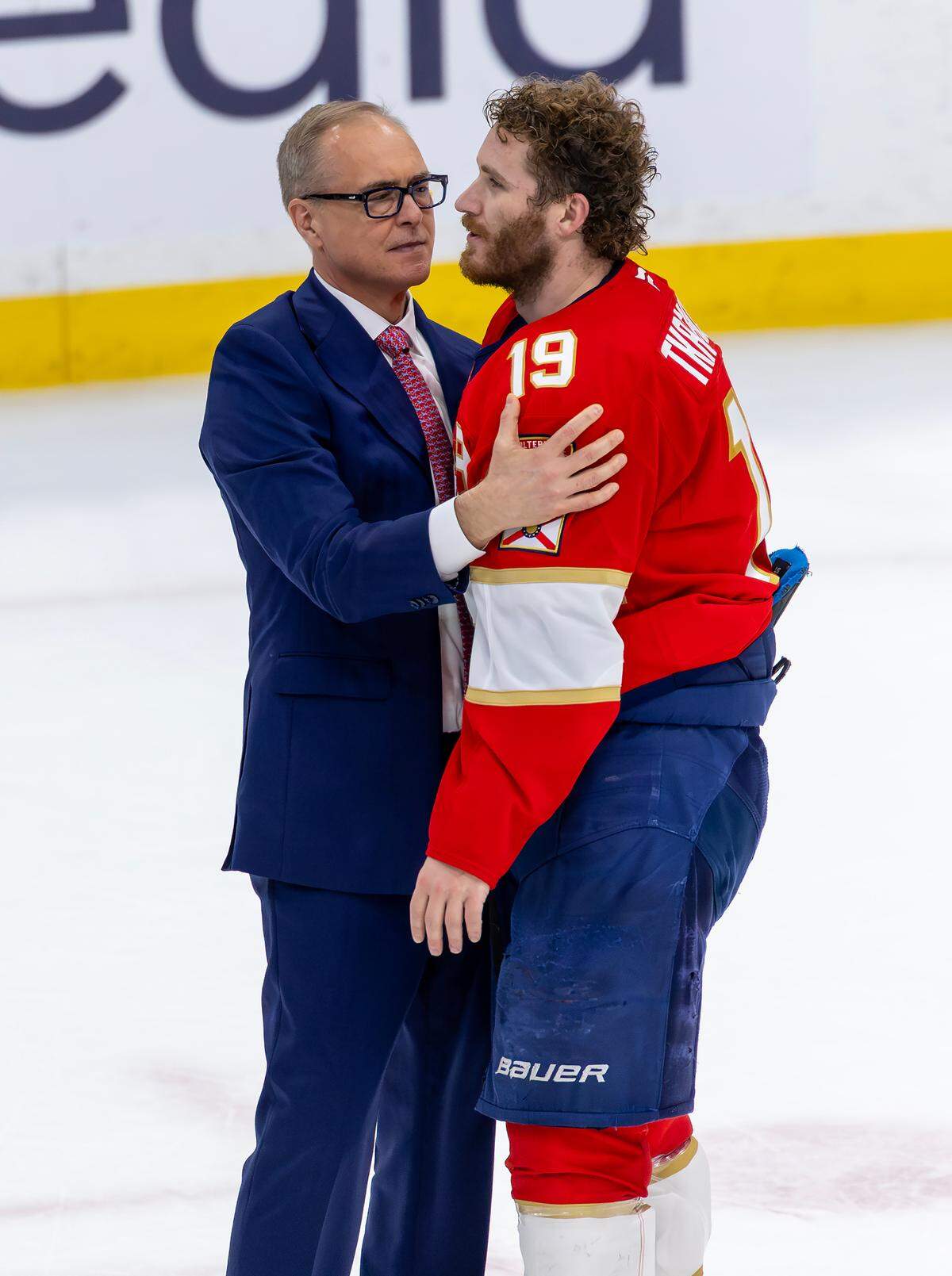 Florida Panthers head coach Paul Maurice embraces left wing Matthew Tkachuk (19) after the Panthers defeated the Edmonton Oilers 5-1 in Game 6 of the Stanley Cup Final at Amerant Bank Arena in Sunrise, Fla., on Tuesday, June 17, 2025, to capture the NHL championship.