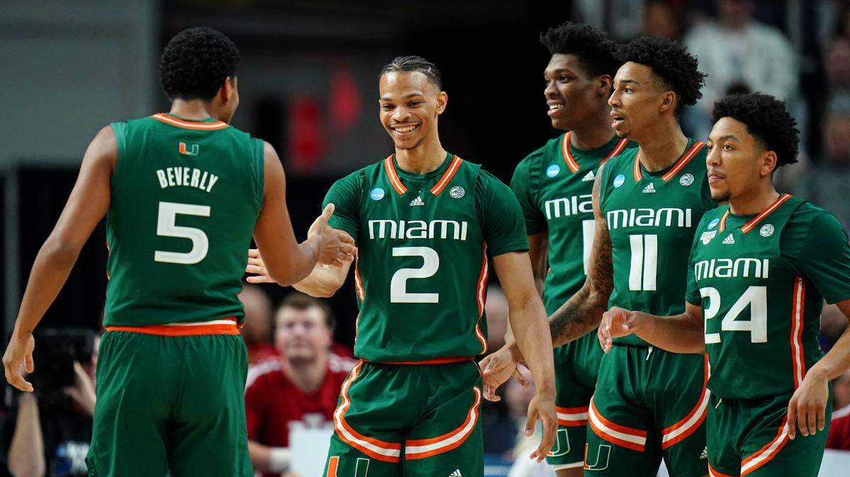 Mar 19, 2023; Albany, NY, USA; Miami (Fl) Hurricanes guard Isaiah Wong (2) high fives guard Harlond Beverly (5) after a play against the Indiana Hoosiers during the first half at MVP Arena. Mandatory Credit: David Butler II-USA TODAY Sports