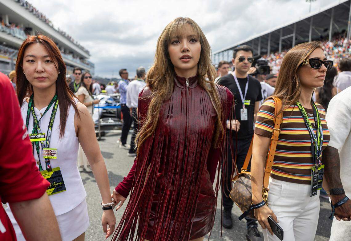 Thai rapper and singer Lisa walks the grid ahead of the Formula One Miami Grand Prix at the Miami International Autodrome on Sunday, May 4, 2025, in Miami Gardens, Fla.