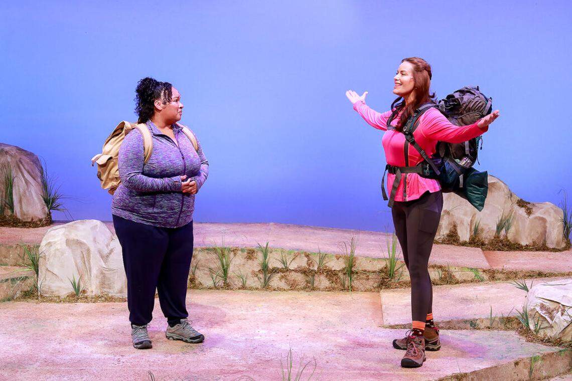 Anna Lise Jensen as Monica talks about the virtues of hiking to Paula played by Kareema Khouri in Actors’ Playhouse’s U.S. premiere of Peter Quilter’s “Step By Step.”