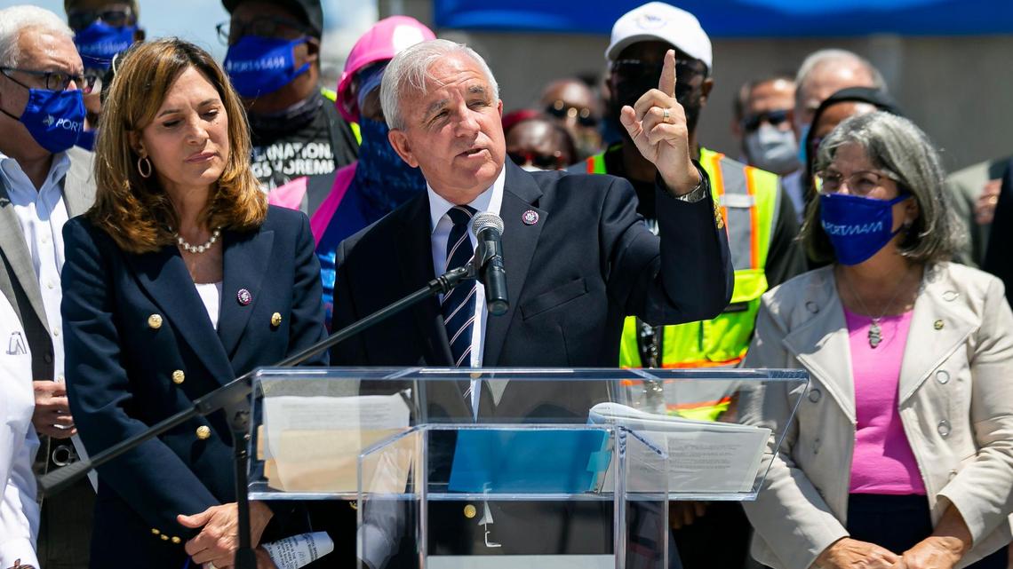 Republican U.S. Reps. Carlos Gimenez, center, and Maria Elvira Salazar, left, during an April press conference on the cruise industry, have developed immigration-reform proposals.
