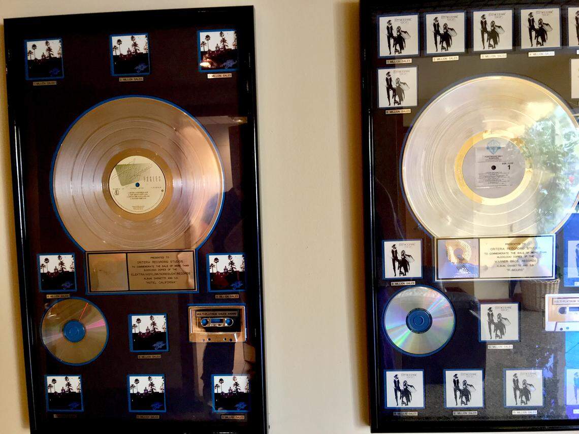 Plaques honoring the multiplatinum success of the Eagles’ ”Hotel California” and Fleetwood Mac’s “Rumours” hang on the walls of Criteria Studios in this 2016 photo. Both albums were recorded or, in Fleetwood Mac’s case, partially recorded at Criteria Studios in North Miami in 1976. Both dominated the album charts starting late that year and “Rumours” would spend 31 weeks at No. 1 through 1977 into January 1978, before another album partially recorded at Criteria bumped it out of No. 1. That album was the “Saturday Night Fever” soundtrack.