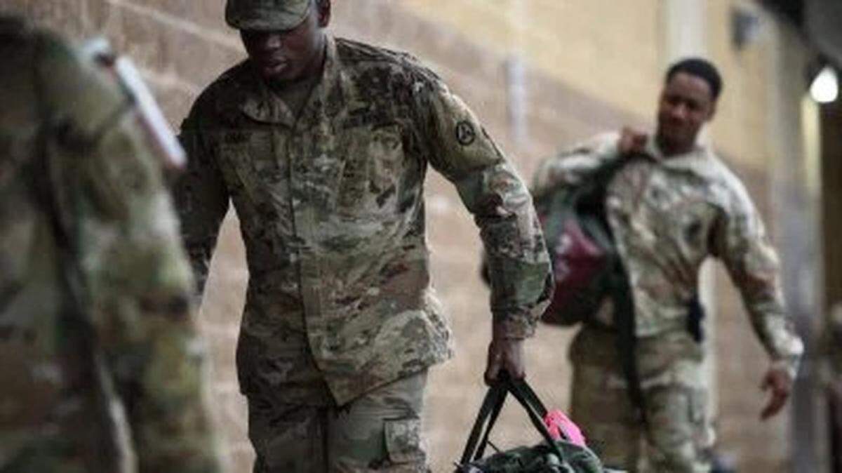 On Jan. 4, in Fort Bragg, North Carolina, troops from the Army’s 82nd Airborne Division get ready for deployment to the Middle East.