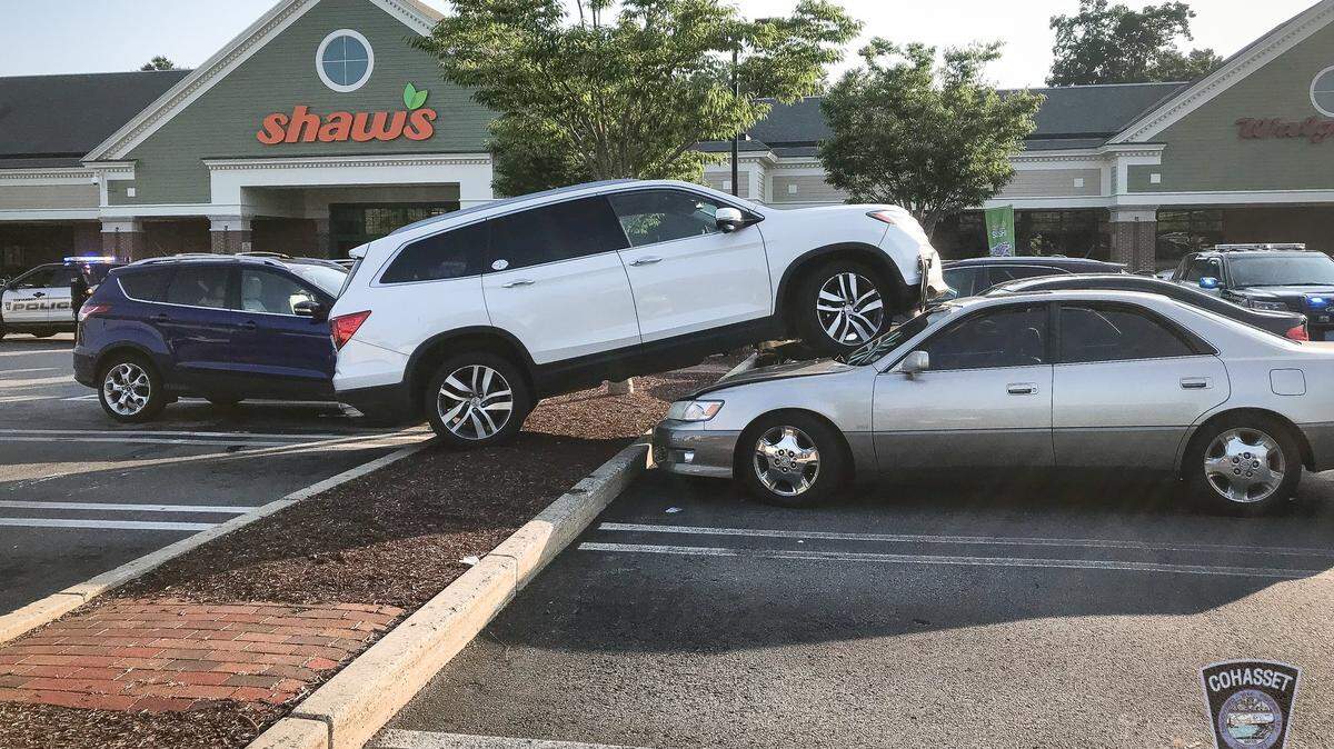 Cohasset, Mass., police say a woman was driving with flip-flops and lost control when one of them became stuck in the pedals, causing her to lose control in a Shaw’s parking lot. The vehicle straddled two other cars before stopping.