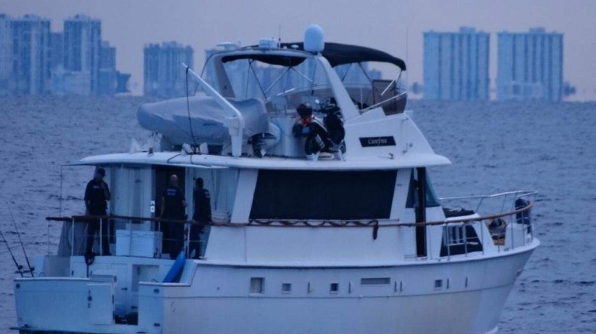 The U.S. Coast Guard stopped the motor yacht, Carefree, in the waters near Fort Lauderdale July 23, 2019. The agency said there were 12 Chinese migrants and two suspected smugglers on board.