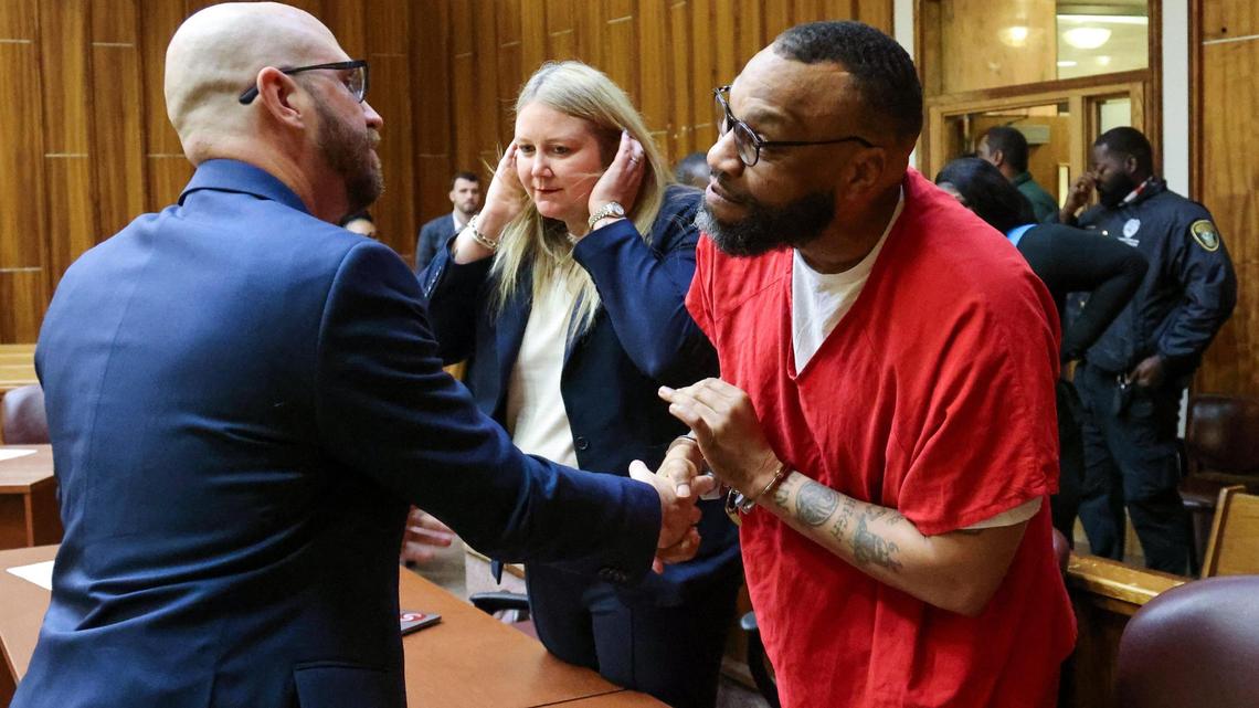 Convicted murderer Corey Smith, center, thanks his attorney, Craig Whisenhunt, after he pleaded guilty to second degree murder in a Miami courtroom on Feb. 5, after the state dropped first-degree murder charges.