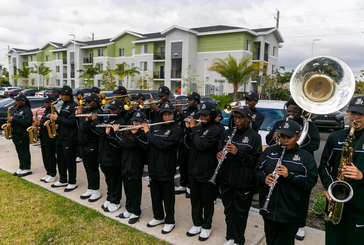 Harmony at Liberty Square has 192 mixed-income apartments, all of which are fully occupied. The Miami Northwestern Senior High School’s Mighty Marching Bulls perform during the grand opening ceremony after completion of the third phase of the Liberty Square project.