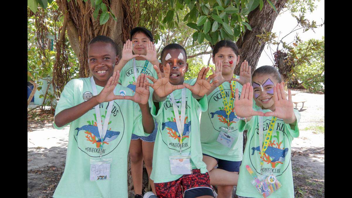 Young citizen scientists learn about marine life, conservation, and the protection of coral reefs and sharks through the Ocean Kids STEM program hosted each year by the University of Miami Rosenstiel School of Marine, Atmospheric, and Earth Science. 