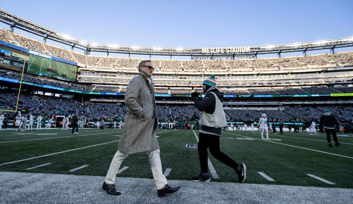 CEO of the Miami Dolphins Tom Garfinkel walks on the sideline before his team plays against the New York Jets in their NFL game at MetLife Stadium on Sunday, Jan. 5, 2025, in East Rutherford, N.J.