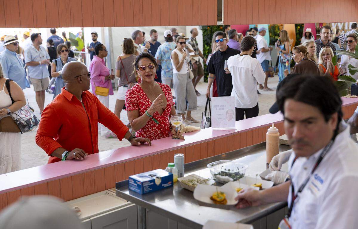 Guests attend the Goya Foods' Grand Tasting Village during the Food Network South Beach Wine & Food Festival on Saturday, Feb. 21, 2026, in Miami Beach, Fla.