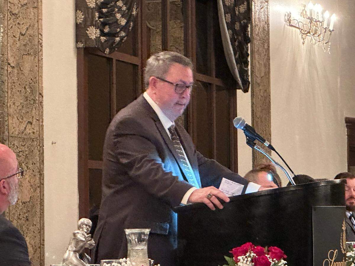 Archbishop McCarthy athletic director Byron Walker is honored for his contributions to high school athletics during the 48th annual Brian Piccolo Awards dinner on Wednesday night at the Signature Grand in Davie, Fla.