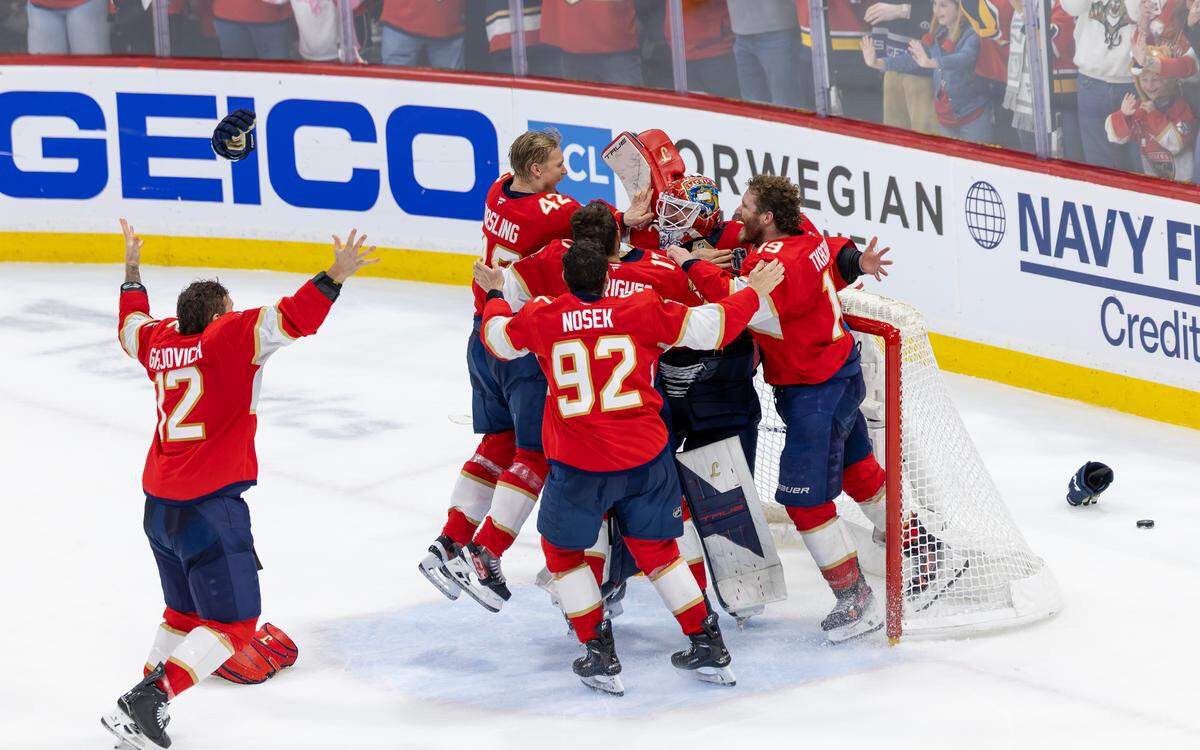 Florida Panthers goaltender Sergei Bobrovsky (72) celebrates with teammates after defeating the Edmonton Oilers 5-1 in Game 6 of the NHL Stanley Cup Final at Amerant Bank Arena on Tuesday, June 17, 2025, in Sunrise, Fla., clinching the Stanley Cup championship.