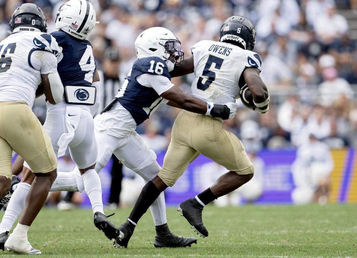 Penn State safety King Mack stops FIU running back Kejon Owens during the game on Saturday, Sept. 6, 2025 at Beaver Stadium.