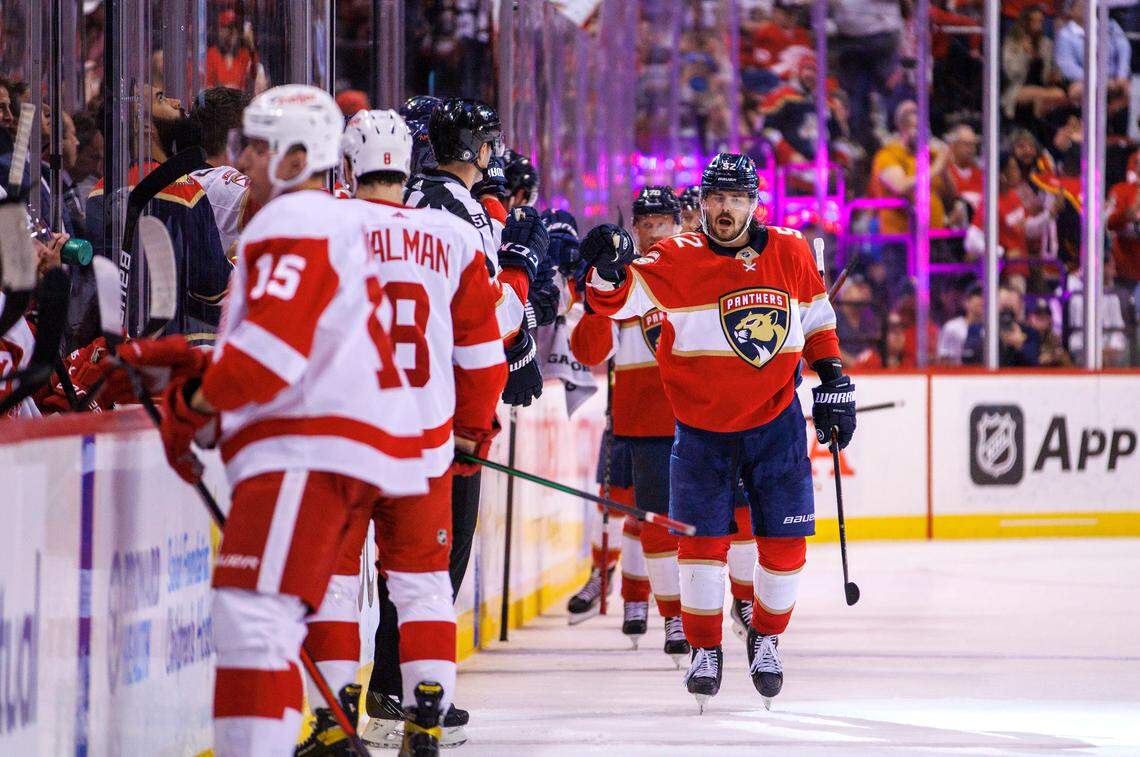 Florida Panthers defenseman MacKenzie Weegar (52) celebrates with the bench after scoring a goal during the second period of an NHL game against the Detroit Red Wings at the FLA Live Arena on Thursday, April 21, 2022 in Sunrise, Fl.