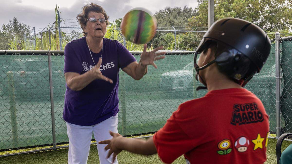 Kyle Smith, CEO-Co Founder of Patches, plays with one of the patients attending the non-profit organization that offers families of seriously ill children daily care 12 hours a day, 5 days a week, from birth to 21 years old, regardless of ability to pay or insurance coverage, in Florida City, on October, 08 2025.