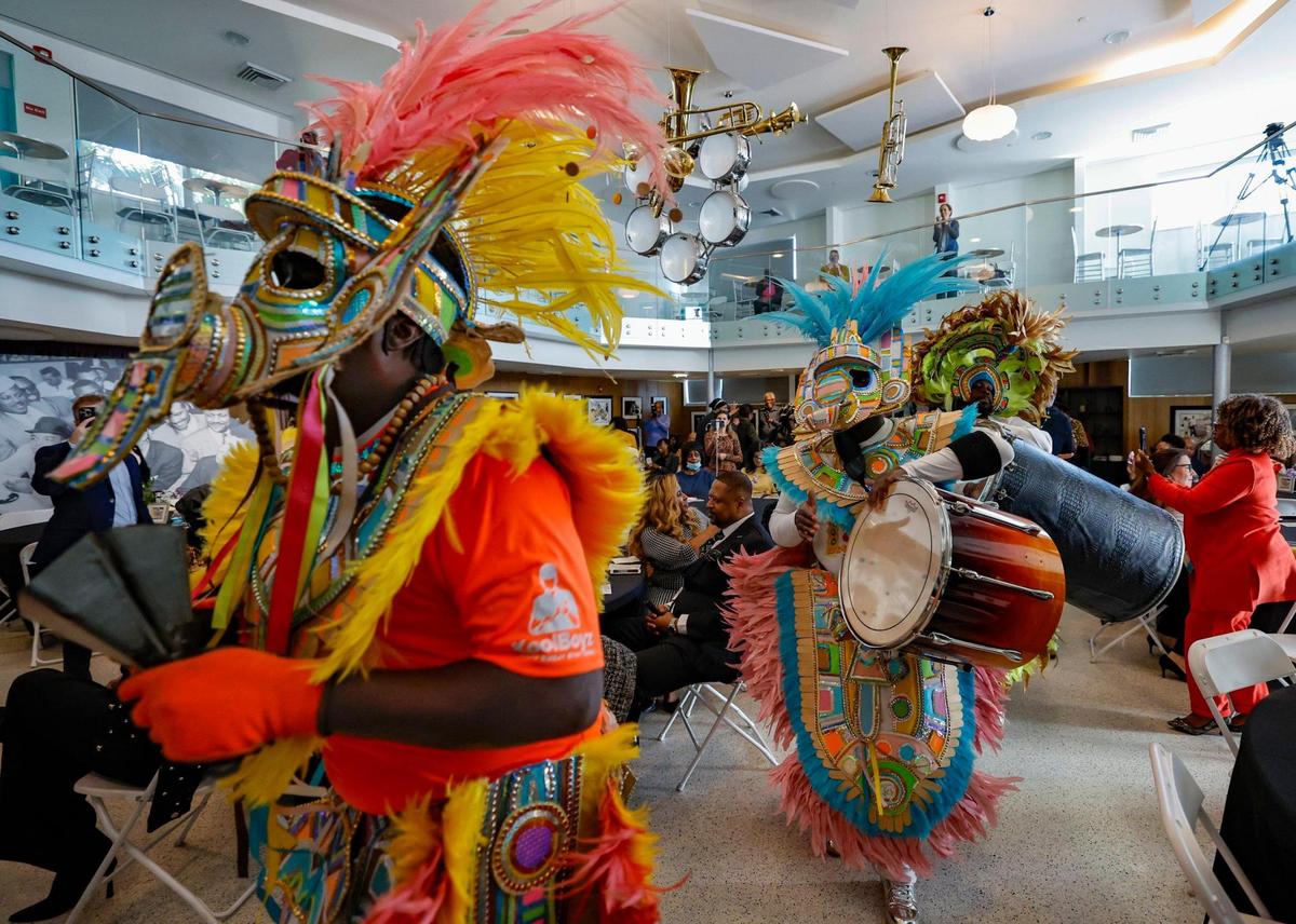 The Showtime Junkanoo Band performs during the street naming ceremony for Dr. Enid Curtis-Pinkney, a historian of Black Miami, at the Hampton House in Miami, Florida, on Friday, November 22, 2024.