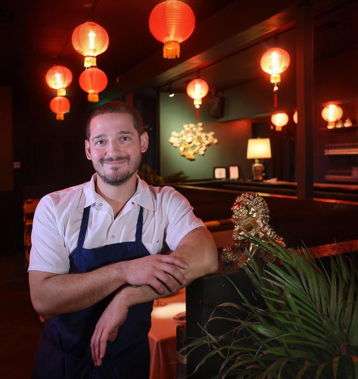Chef Adrian Ochoa, who grew up in Kendall, in the warm and inviting interior of Double Luck restaurant in Miami.