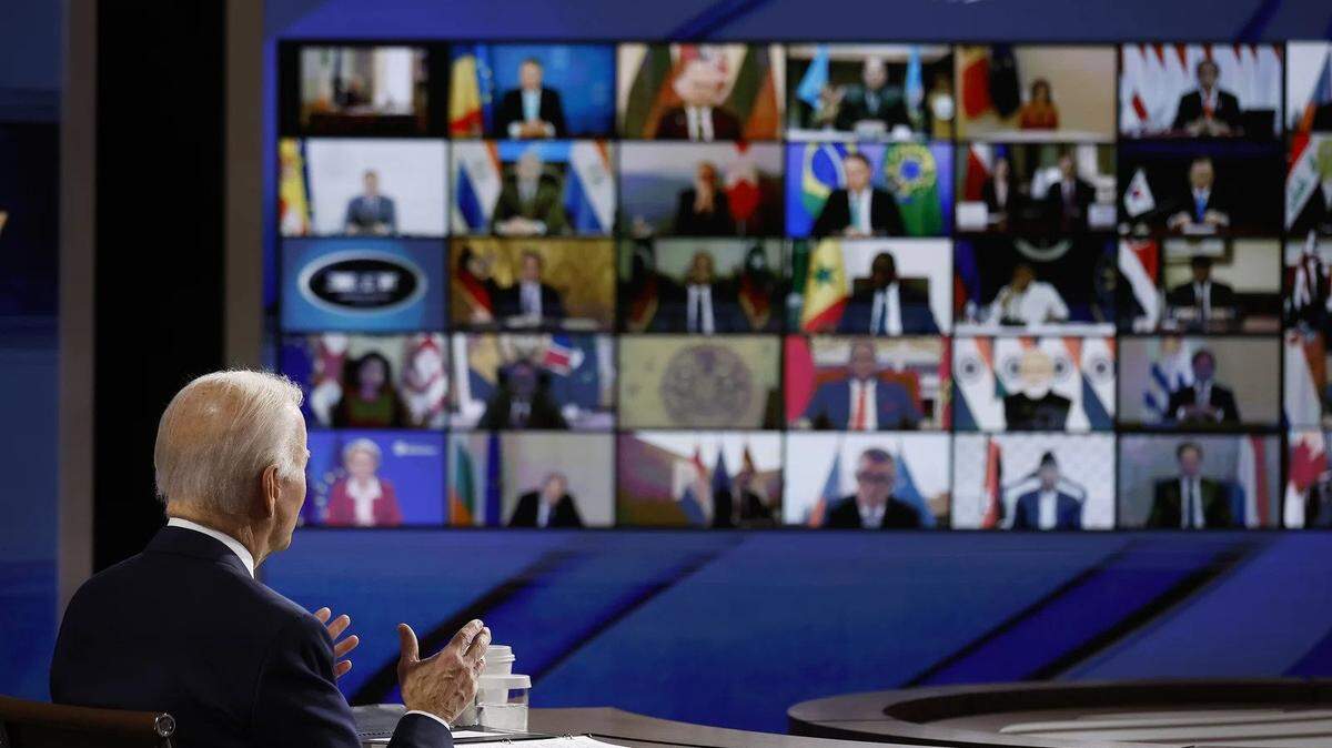 President Biden speaks to participants in the Summit for Democracy from a soundstage that the White House set up for such virtual events.