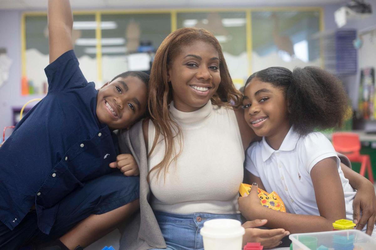 Francesca Blackshear, 37, and her kids Matthew Blackshear, 7, and Makayla Blackshear, 9, pose for a family portrait at Arc Broward in Sunrise on Friday, Dec. 2, 2022. Francesca Blackshear is battling cancer for the fourth time.