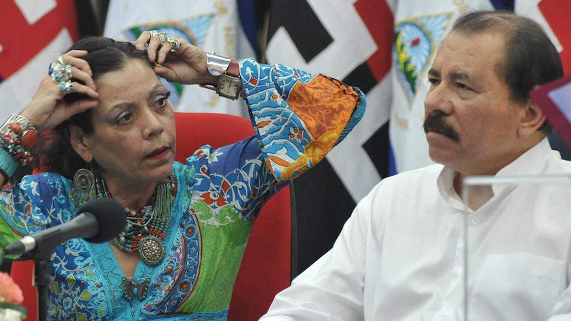 Nicaraguan President Daniel Ortega sits with his wife, Vice President  Rosario Murillo.