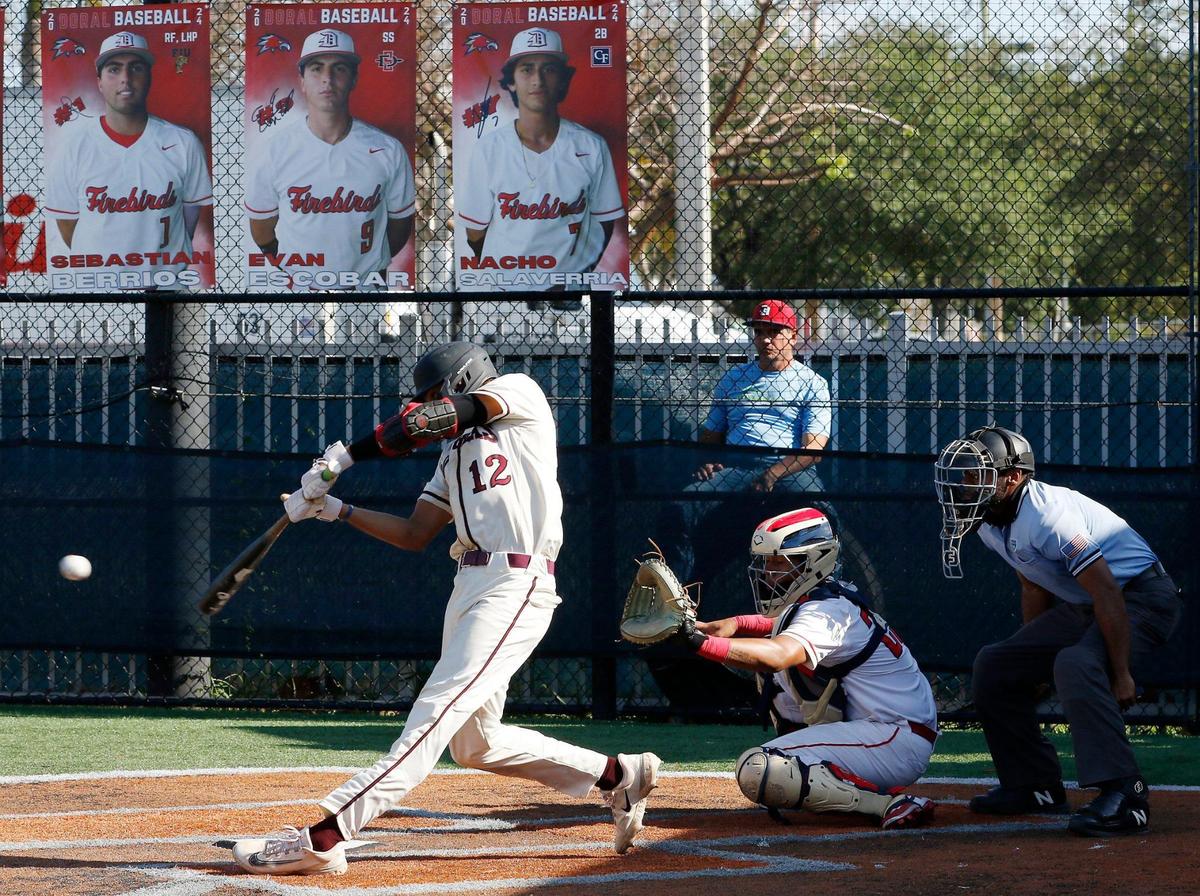 Stoneman Douglas Eagles Gio Rojas (12) bats against Doral Academy Firebirds during the baseball game on Friday, April 19, 2024 at Doral Academy HS in Doral. Andrew Uloza / for Miami Herald
