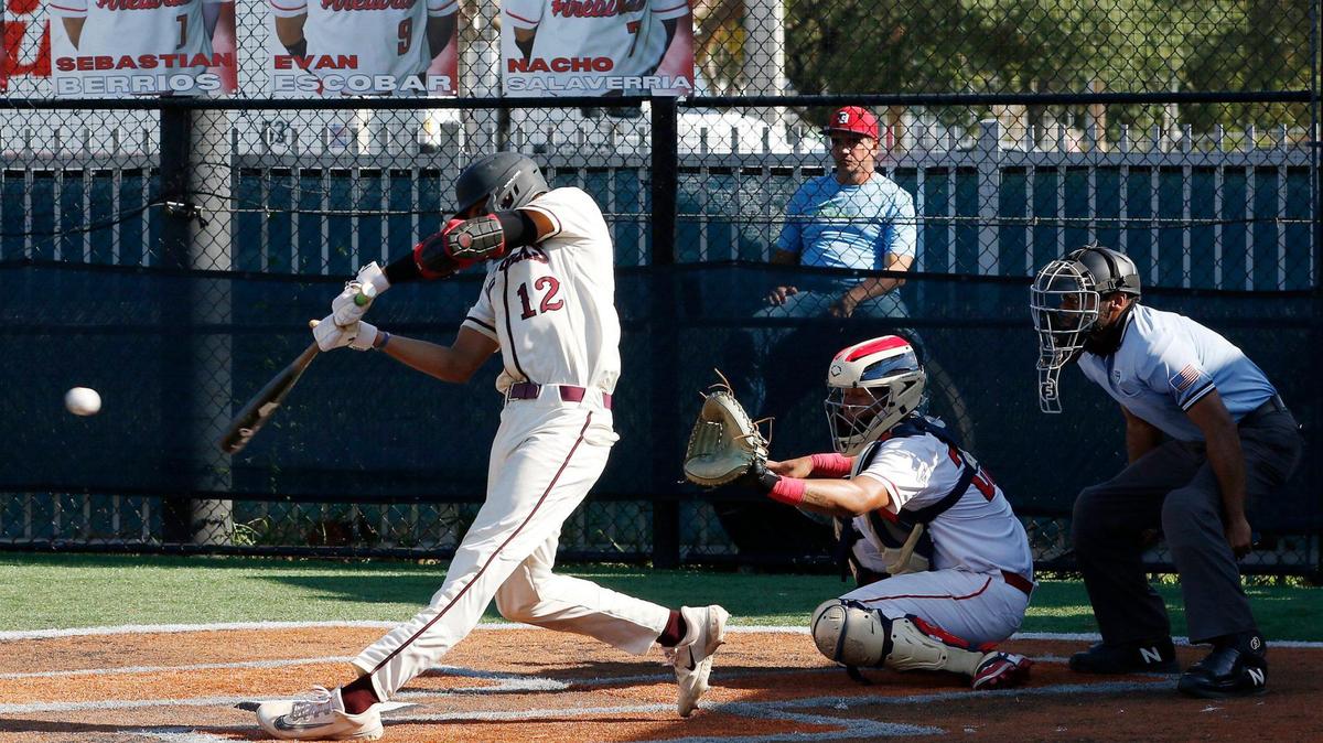 Stoneman Douglas Eagles’ Gio Rojas (12) bats against the Doral Academy Firebirds during a baseball game on Friday, April 19, 2024 at Doral Academy HS in Doral.
