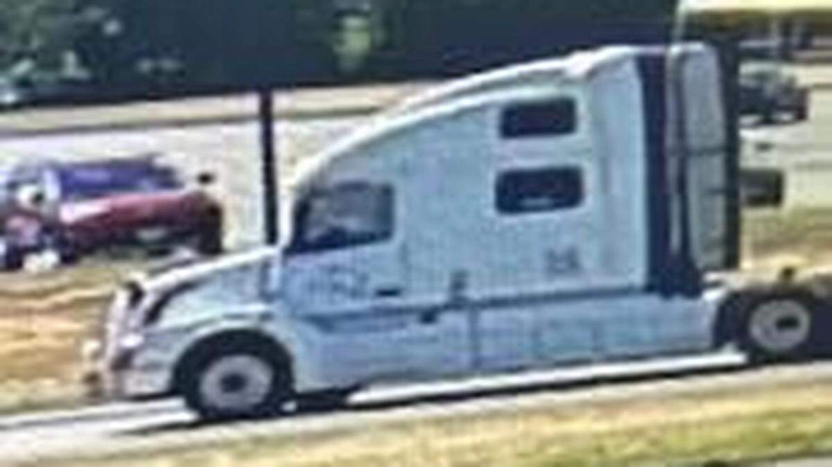 A bleeding woman yelling for help was pulled into a white tractor-trailer cab in South Brunswick, New Jersey, police say. A search is underway for the vehicle.
