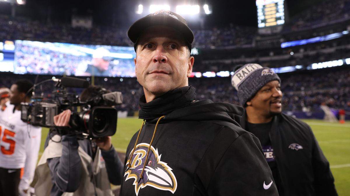 BALTIMORE, MARYLAND - DECEMBER 30: Head Coach John Harbaugh of the Baltimore Ravens stands on the field after the Baltimore Ravens 26-24 win over Cleveland Browns at M&T Bank Stadium on December 30, 2018 in Baltimore, Maryland. (Photo by Patrick Smith/Getty Images)
