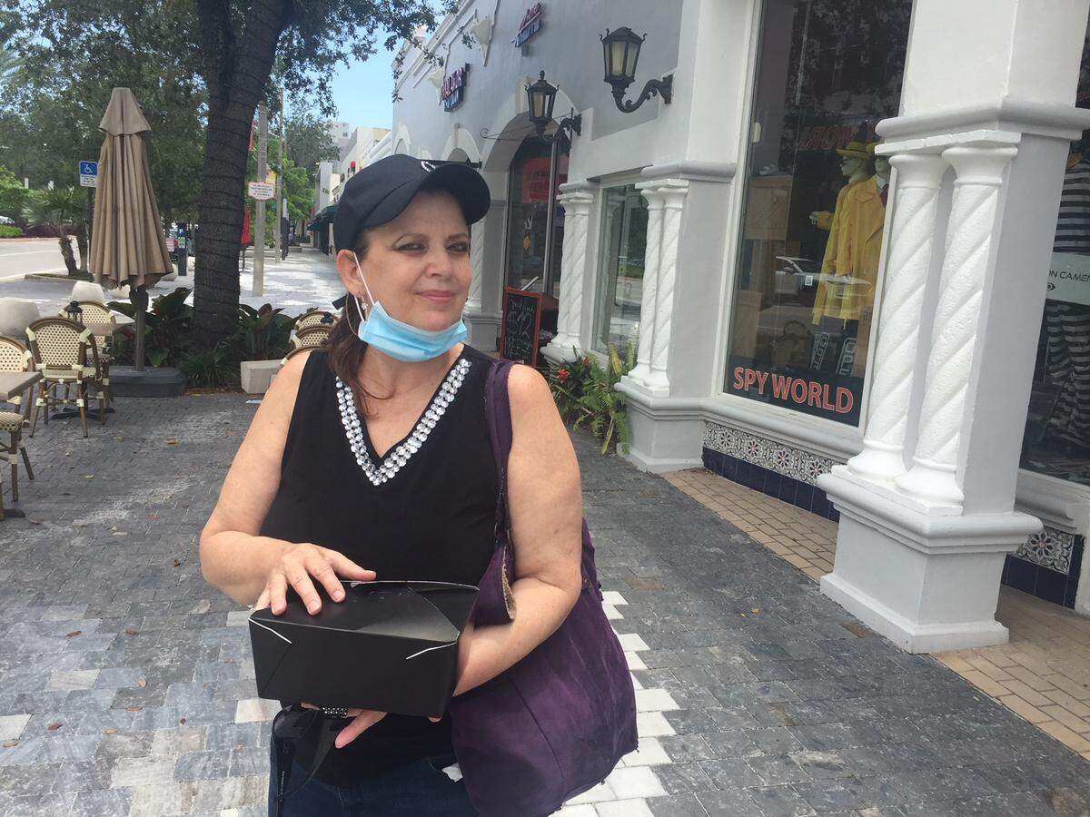 Nanette Lemus ventured out of her house to do a little shopping on Miracle Mile in Coral Gables on Wednesday, May 20, 2020.