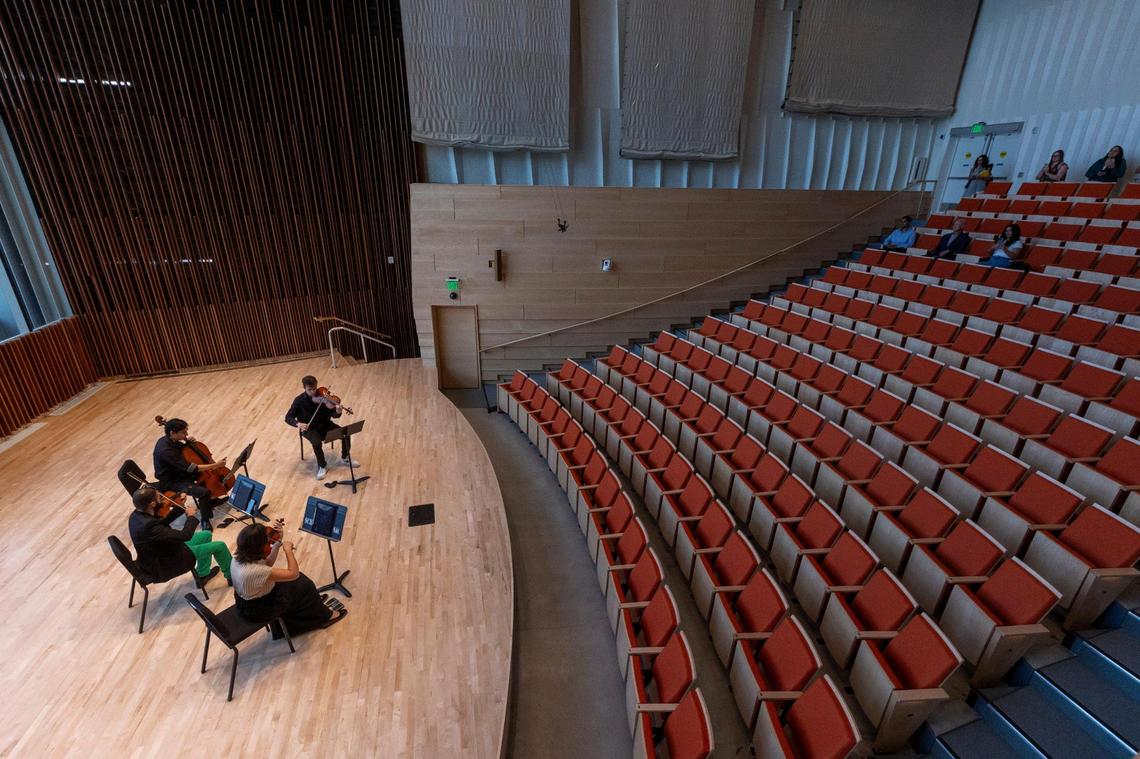 Performers on stage inside the concert hall in the Knight Center for Music Innovation at the University of Miami.