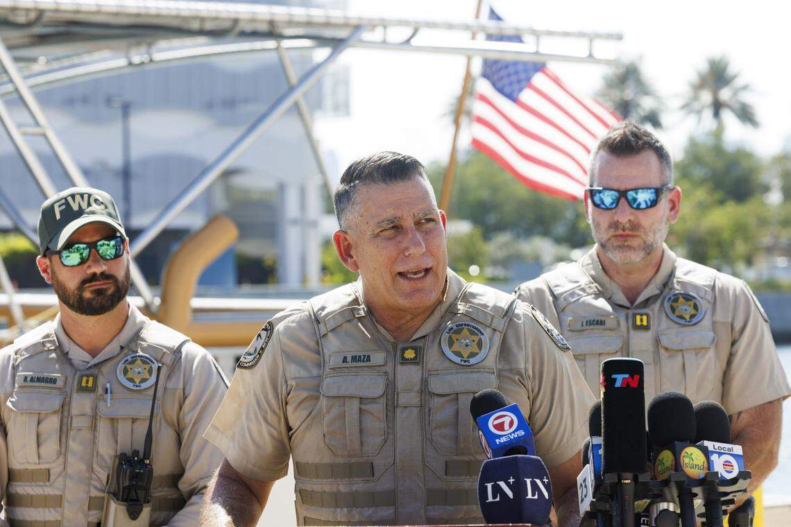 Alberto Maza, regional commander with Florida Fish and Wildlife Conservation Commission, center, speaks during a Coast Guard press conference on Tuesday, July 29, 2025, at the Coast Guard Sector Miami in Miami Beach providing an update on the boat crash off Hibiscus Island in Miami Beach on Monday. A barge crashed into a sailboat in Biscayne Bay, killing two young girls and seriously injuring two others. 