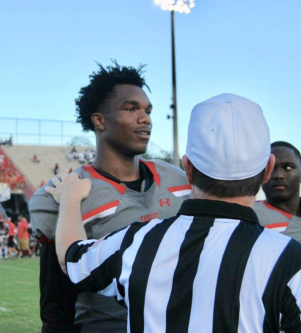 Referee speaking to Orlando Edgewater’s Nate White.